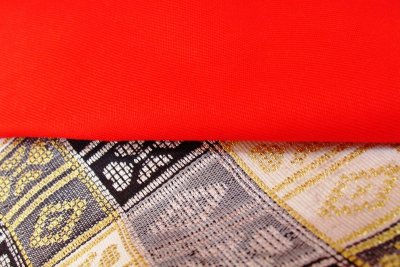Red napkin and a Songket by Tabrizi
