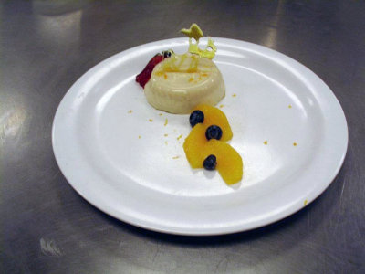 Chef Bruce Schuver Orange Custard,  Caramel Lace, Orange Supreme, Fresh Berries ..jpg