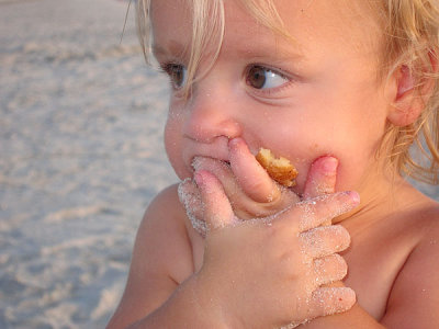 Why are these kids always eating donuts at the beach?