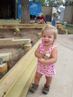 Annie transports wood blocks