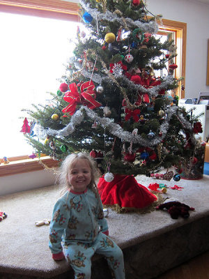 Posing with Christmas tree