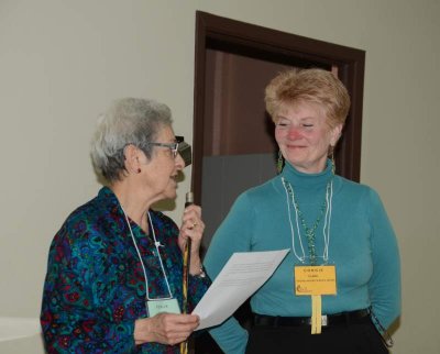 Fenja reading citation for Connie Clark's George McGee Service Award