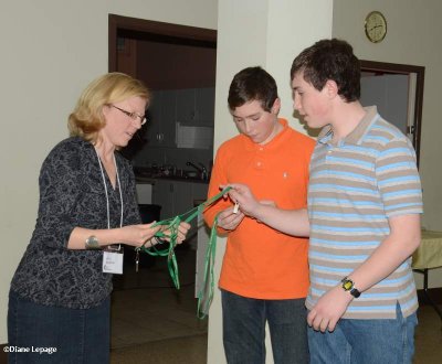 Jordan and Nathan receiving a prize from Holly for their Macoun Club exhibit