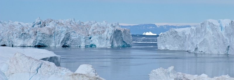 Sermermiu glacier with white iceberg