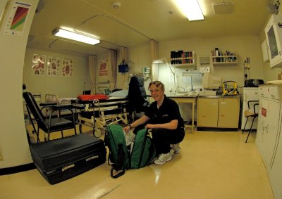 Anna the medic checks her equipment bag