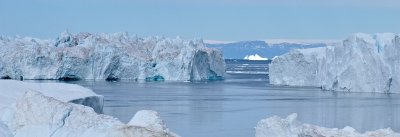 Sermermiu glacier with white iceberg