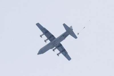 Paratroop emerging from C-130 over Moosonee.