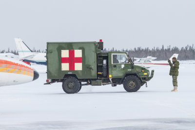 Positioning army ambulance on tarmac at Moosonee