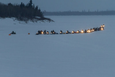 Soldiers on snowmobiles on the Moose River at Moosonee 2013 February 21st.