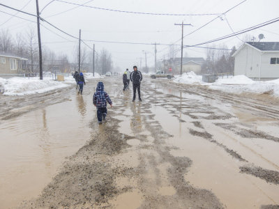 No school buses, children walking home at lunch.