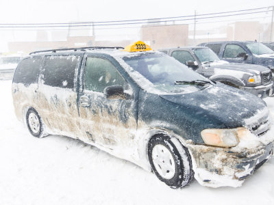 2013 April 19th ice covered taxi at Northern in Moosonee