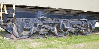 Three axle truck on old baggage car used as museum car in Moosonee