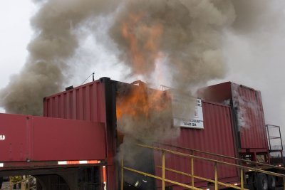 Flames and smoke coming out of mobile training unit