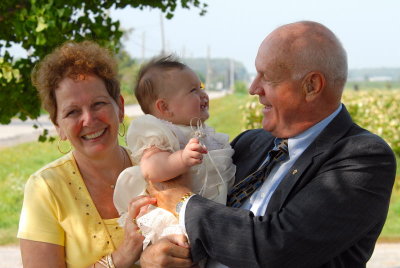 Godparents Geoff and Jean with Maria