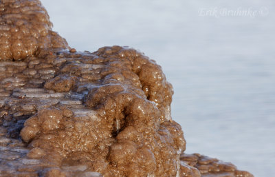 Frozen sandy splash along Wisconsin Point