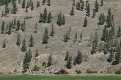 Cabin at the foot of a mountain