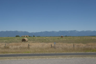 Hay bales and Swan Mountains*