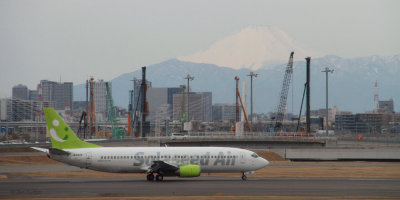Tokyo Haneda airport with Mount Fuij, Honshu Japan