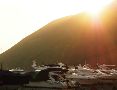Sun setting over yachts in the Typhoon Shelter