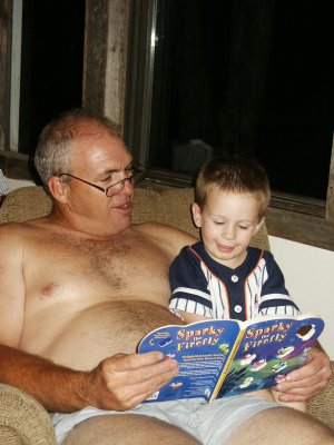 My new favorite pastime...reading with Daddy