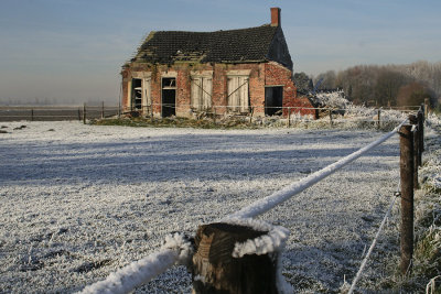 old polder cottage in winter