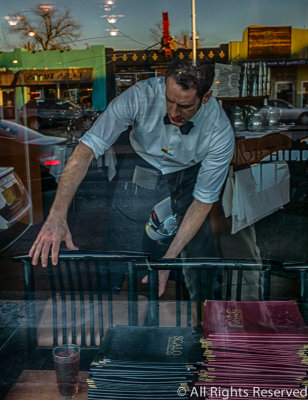 Waiter Through A Window