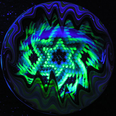 And it glows! Robin used UV glass, and Rick used glow glass for the dots around the equator.