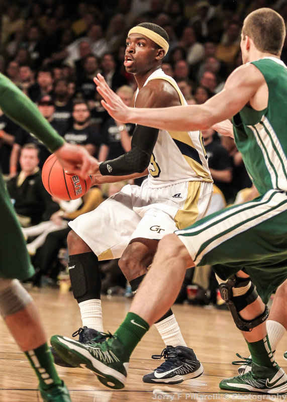 Georgia Tech G Reed looks to pass through the Tulane defense