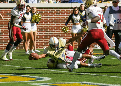 Yellow Jackets QB Tevin Washington breaks the plane with the ball to score a first quarter touchdown