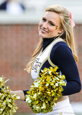 Yellow Jackets Cheerleader works the crowd during the game