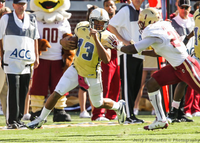 Yellow Jackets QB Washington is pushed out of bounds by Eagles LB Kevin Pierre-Louis