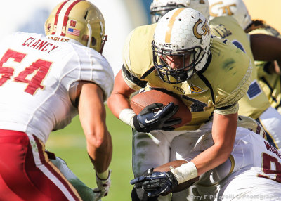 Georgia Tech RB Laskey is stopped by BC DT Bryan Murray and LB Clancy