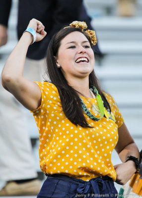 Tech Fan cheers her team on from the north end zone student section