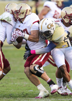 Jackets DB Demond Smith tackles Eagles WR Swigert in the backfield