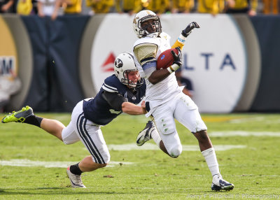 Jackets DB Golden avoids the tackle attempt by BYU K Justin Sorensen on a kickoff…