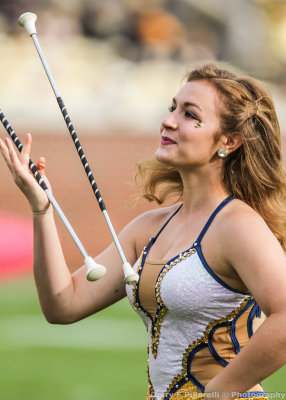 Tech Twirler performs on the field at halftime
