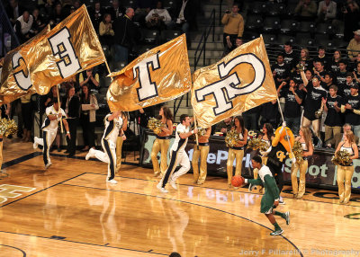 Yellow Jackets Cheer squad brings the flags out before tipoff