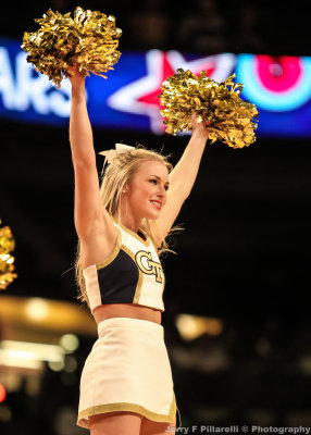 Georgia Tech Cheerleader performs during a timeout