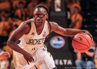 Tech G Brittany Jackson brings the ball up court