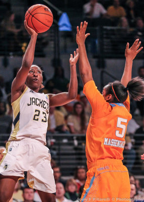 Georgia Tech G Sydney Wallace shoots a jumper over Tennessee PG Ariel Massengale