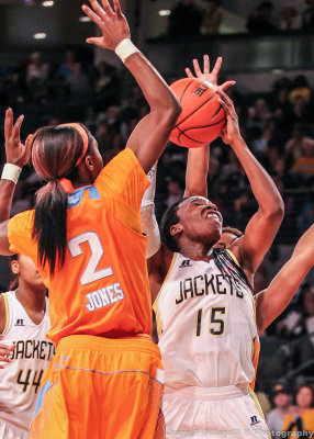 Jackets G Marshall shoots over Lady Volunteers F Jasmine Jones