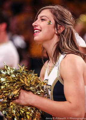 Georgia Tech Cheerleader cheers the team on during a timeout