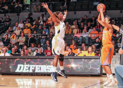 Jackets F Rogers leaps to disrupt the Lady Volunteers inbounds pass