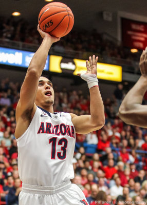 Cats G Johnson puts up a running jumper