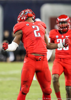 Wildcats S Flowers celebrates his fumble recovery
