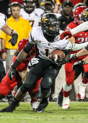 Arizona State RB Grice tries to get away from an Arizona defender