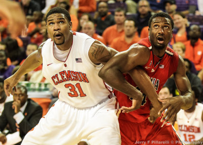 Wildcats F Hill fights for rebounding position against Tigers F Devin Booker