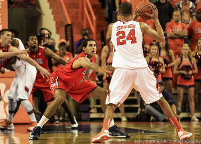 Wildcats F Jerrett gets into solid defensive position against Tigers F Jennings