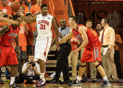 Arizona C Tarczewski waits for Clemson F Booker to make a move