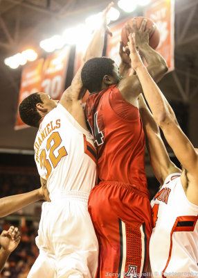 Wildcats F Hill puts up a shot under the glare of the Littlejohn Coliseum lights at Clemson University